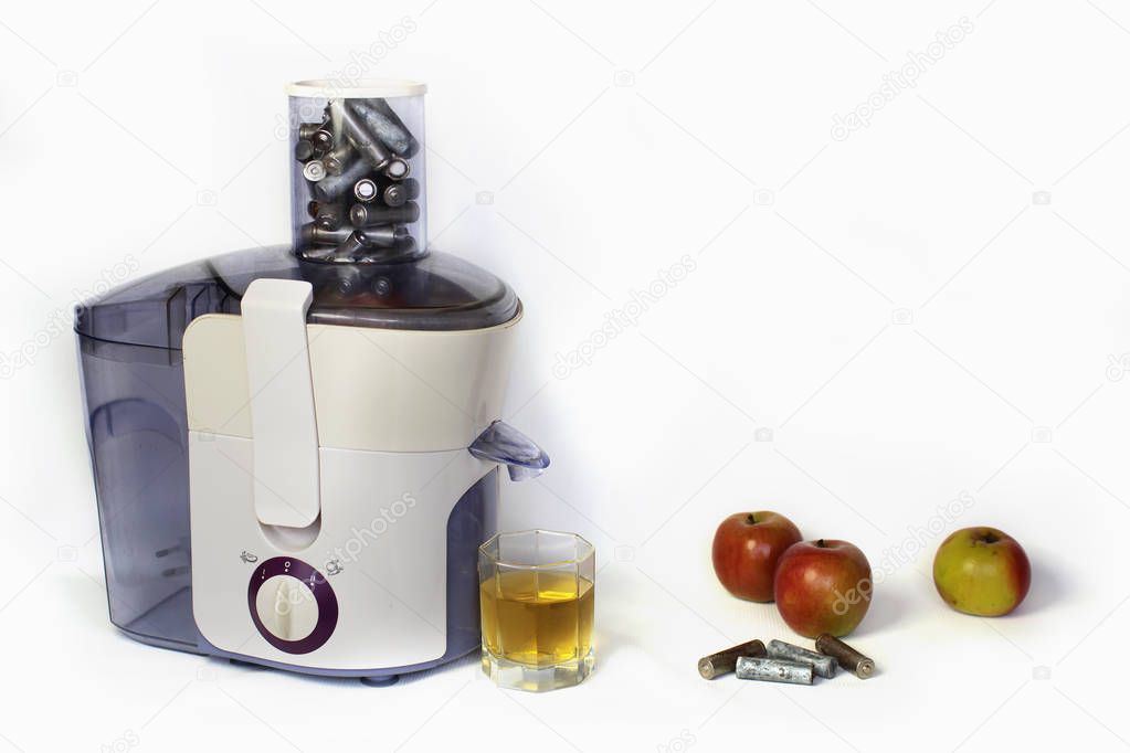 Electric juicer with used batteries instead of fresh fruits or vegetables, white background, ecological problem, earth pollution caused by wrong dispose of electronic equipment, focus on batteries