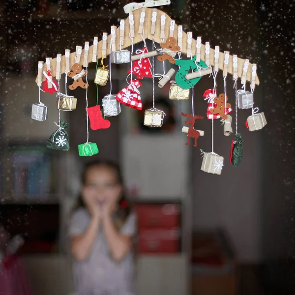 Cute Little Kid Stretching Advent Calendar Small Gifts Child Searching — Stock Photo, Image