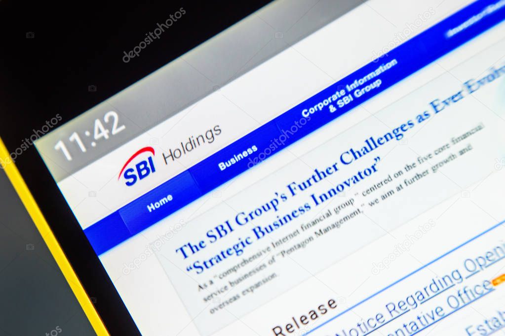 Berdyansk, Ukraine - April 2, 2019: Illustrative Editorial of SBI Holdings website homepage. SBI Holdings logo visible on the phone screen