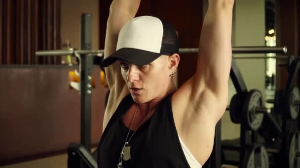 Strong girl working out with dumbbells — Stock Video