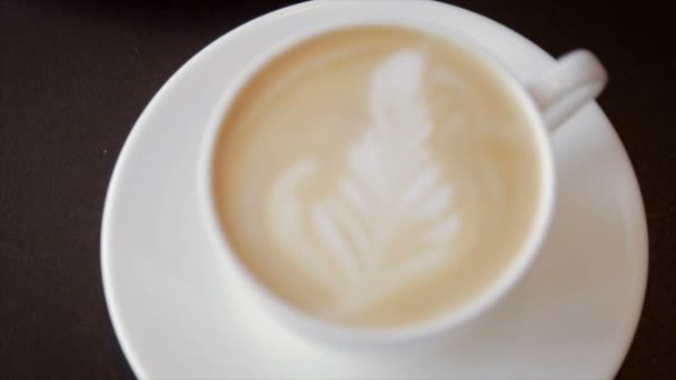 Coffee with whipped cream in a white cup — Stock Video