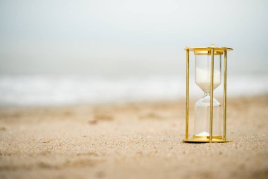 Kum saati sahilde, iş zaman yönetimi kavramı