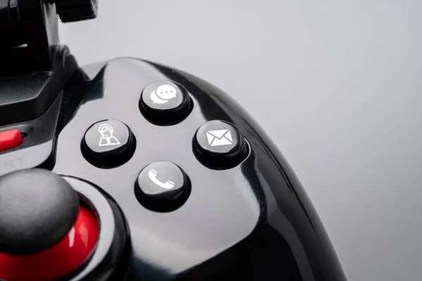Contact us icon on colorful game controller — ストック写真