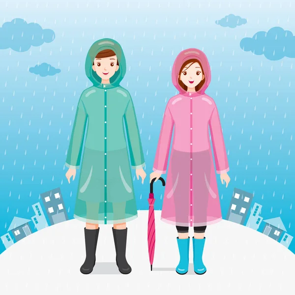Mężczyzna i kobieta podróżny noszenie Raincoats, stojący w Rai — Wektor stockowy