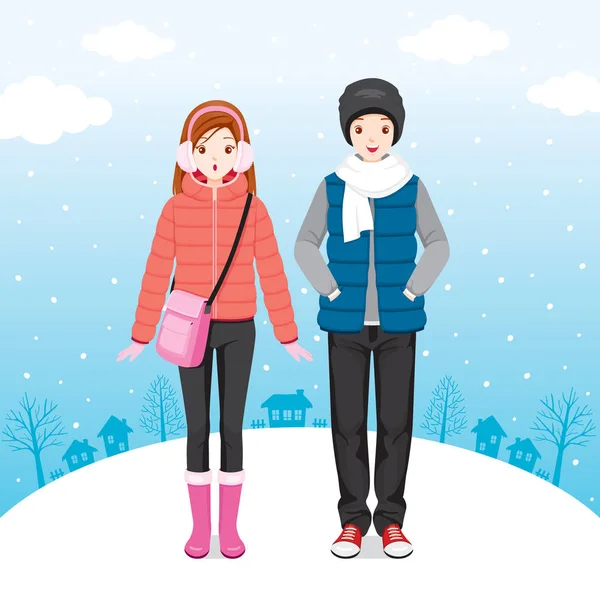 Homem e mulher viajante vestindo casaco de inverno, de pé em neve —  Vetores de Stock