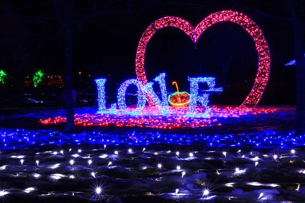 inscription love and heart made by LED lights