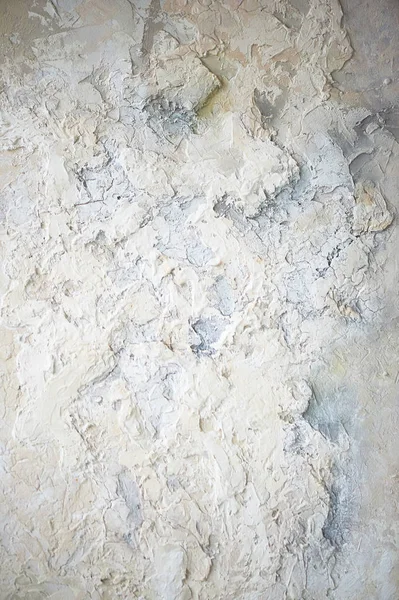 Stuck an einer weißen Wand mit altem Putz. — Stockfoto