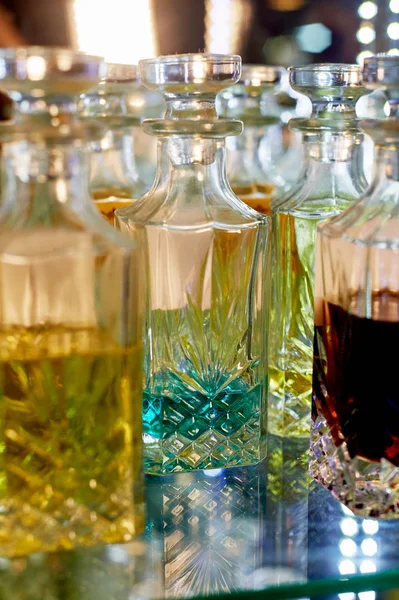 Glass perfume bottles based oils.A Bazaar, market.Aroma oils, oil perfume in faceted glass vessels.