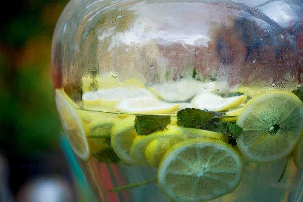 Refreshing lemonade in a steamed-up can. Picnic, catering at the event.