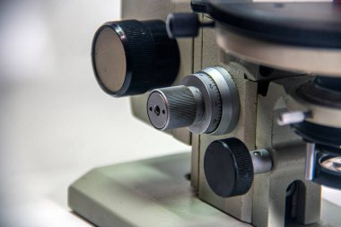 Knobs and controls from an old microscope