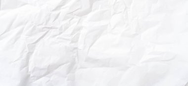 Üst görünüm ve buruşmuş beyaz kağıt dokusu dekoratif sanat eserlerinde buruşmuş beyaz kağıt arkaplan dokusu olarak kullanılır..