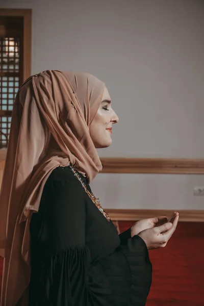 Muslim girl pray in mosque