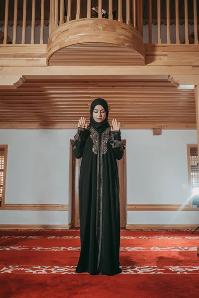 Muslim woman pray in mosque