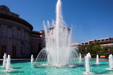 Beautiful fountain in the city . Summer day.	