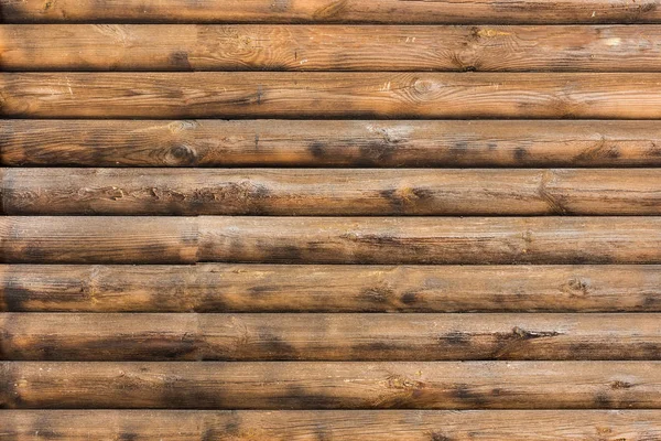 Textura listrada de madeira, um padrão marrom . — Fotografia de Stock