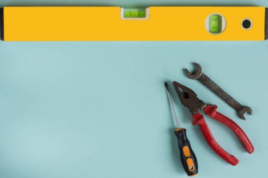 Set of different men tools on the pastel colorful background. 	