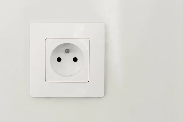 White socket on a white background. — Stock Photo, Image