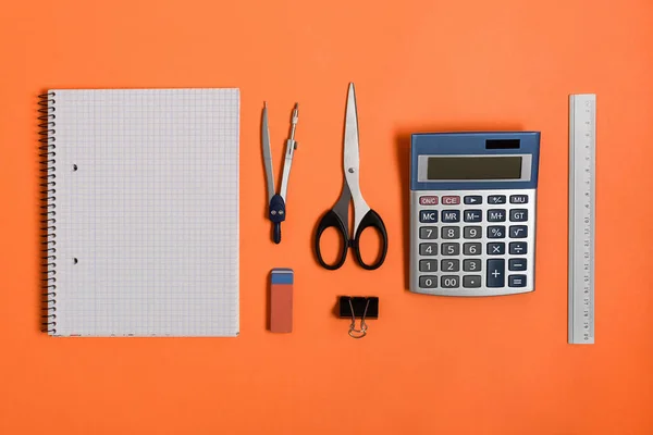 Blank Notebook School Office Supplies Orange Background Top View Back — Stock Photo, Image