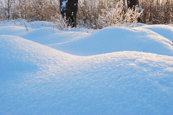 Winter Siberian city park in snowdrifts