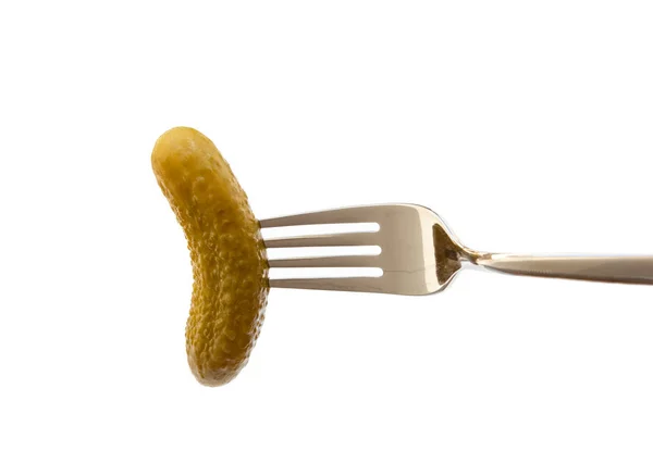 stock image Pickled sour cucumber impaled to fork on white background