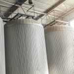 Brewery tanks containers beer production . Toned Image.
