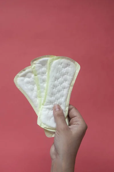 Woman holding panty liners — Stock Photo, Image