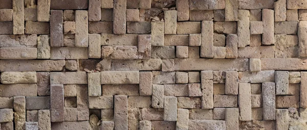 Ein alter Backsteinmauerhintergrund — Stockfoto