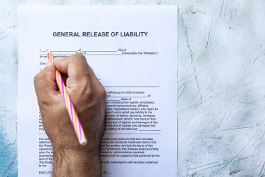 Filling General Release of Liability form clipart