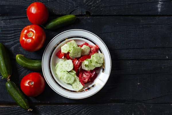 Fresh healthy cucumber and tomato salad — Stock Photo, Image