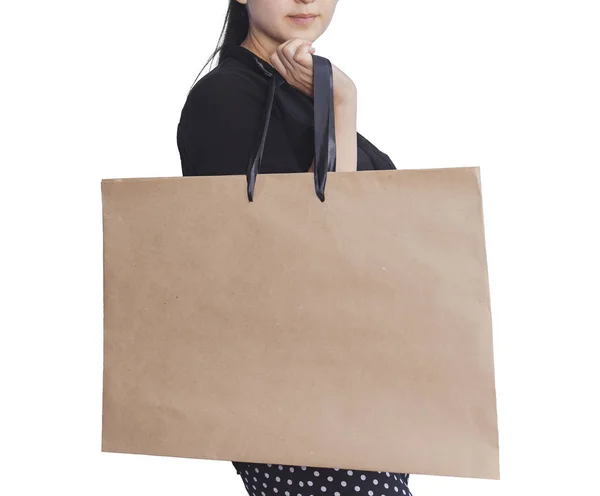 Menina feliz com sacos de compras isolados no branco — Fotografia de Stock