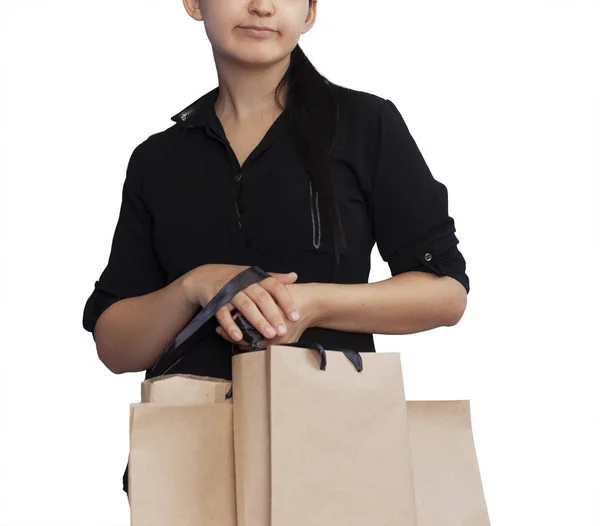 Gelukkig meisje met boodschappentassen geïsoleerd op wit — Stockfoto