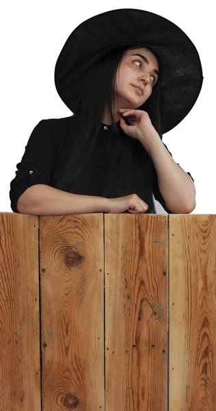 Halloween fille en costume de sorcière sur planche en bois — Photo