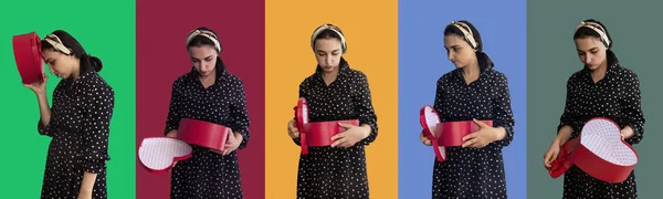 Фотосесія молодої жінки, що відкриває червону подарункову коробку — стокове фото