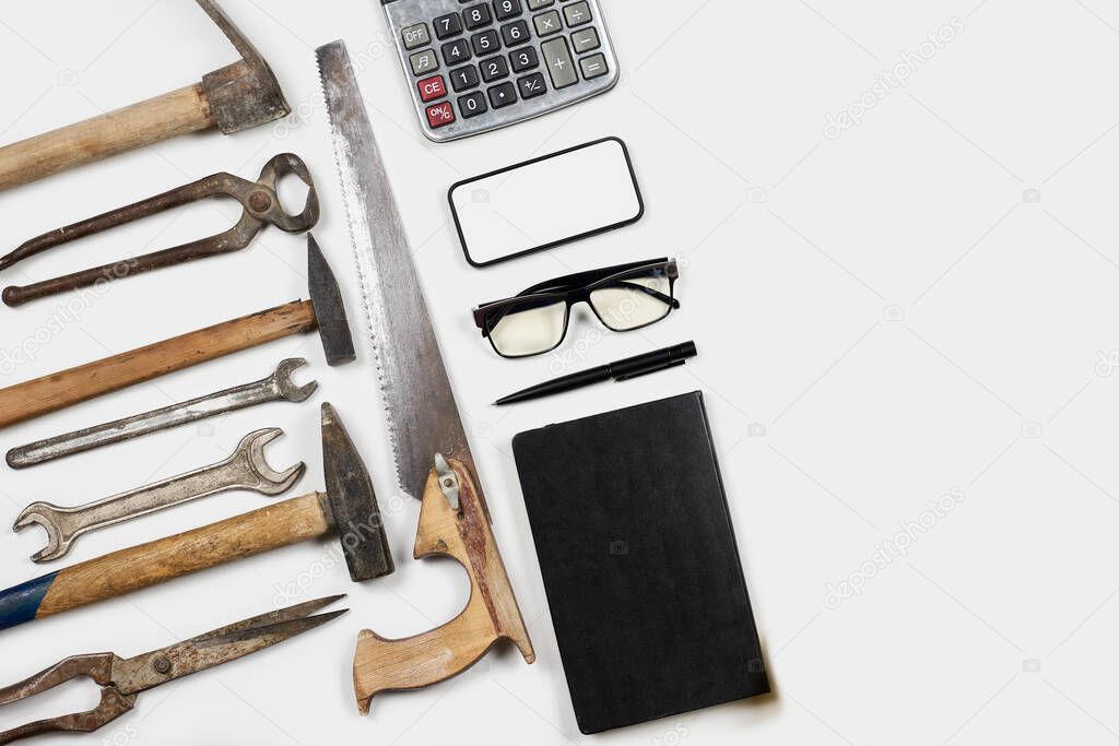 Working tools and office supplies on white