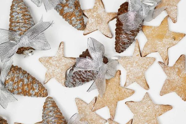 Pine cones decorated with ribbons — Stock Photo, Image