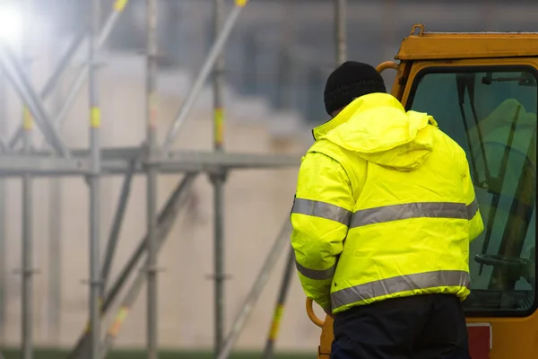 Forklift driver at the construction site — Stock Photo, Image