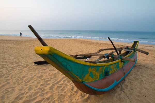 Traditional Sri Lanka Catamaran on the Hikkaduwa beach 