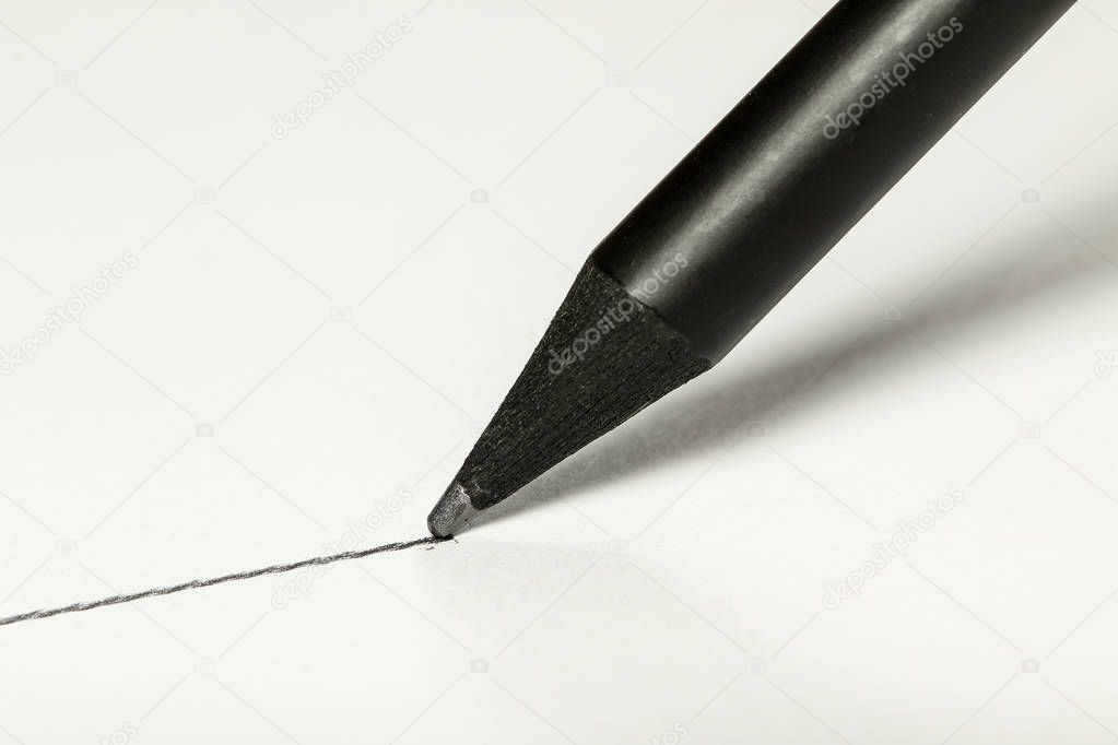Straight line drawn with the black pen on a white background