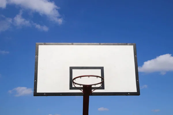 Basketball hoop on sky and clouds background — Stock Photo, Image
