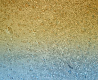  Soyut mavi ve altın su damlaları ve kabarcıklar