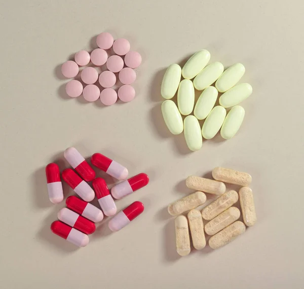 Top view of Four Bunch of colorful capsules and pills — Stock Photo, Image