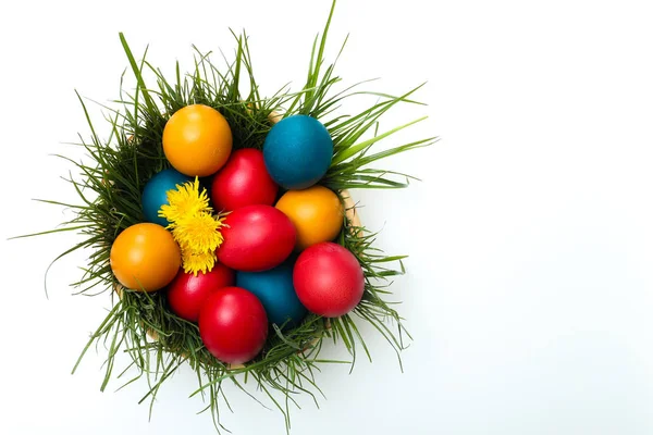 Basket full of painted easter eggs — Stock Photo, Image