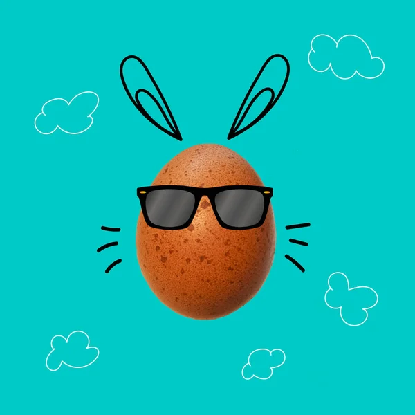 Easter egg with  bunny ears and sunglasses — Stock Photo, Image