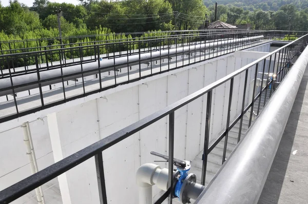 Reconstructed wastewater treatment facilities in a small town. Corridor aerotanks for artificial biological sewage treatment were constructed