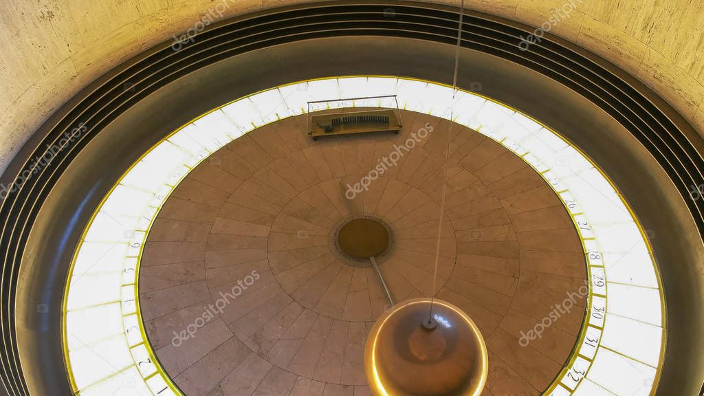 close up of the foucault pendulum at griffith observatory