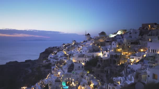 Schöne aufnahme im sonnenuntergang von oia, santorini — Stockvideo