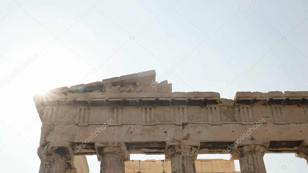 close up of a backlit parthenon at the acropolis in athens, greece