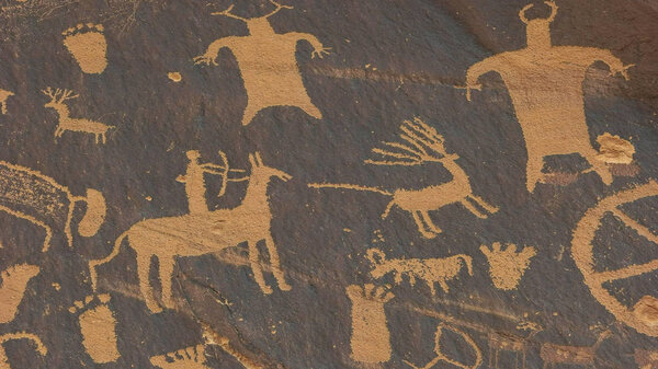 close up of a hunting scene at newspaper rock in utah