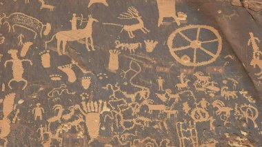 shot of american indian art on newspaper rock, utah clipart