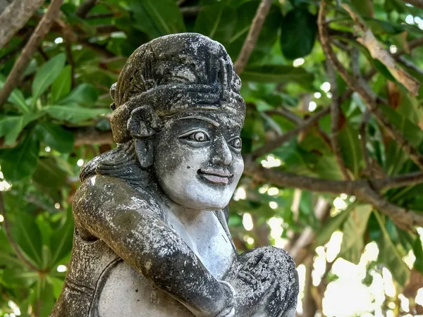 KUTA, INDONESIA - JUNE, 15, 2017: close up of a stone statue at kuta beach — Stock Photo, Image